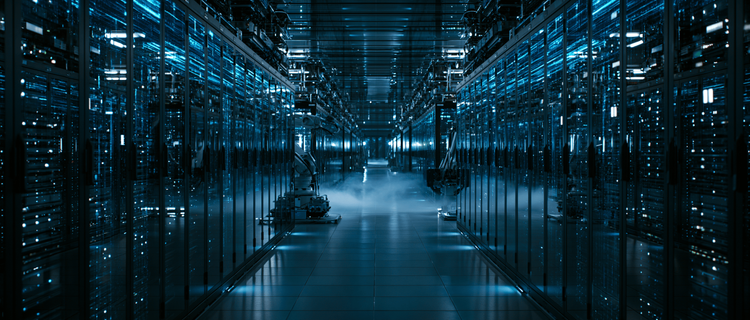 Technician inspecting fiber optic cabling and connectors in a data center